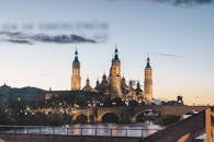 Capture of Basilica de Nuestra Señora del Pilar at twilight over the Ebro River in Zaragoza, Spain.